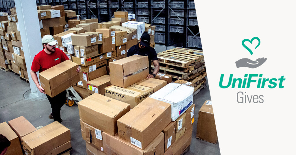 UniFirst distribution center staff pack thousands of garments to donate to United Way
