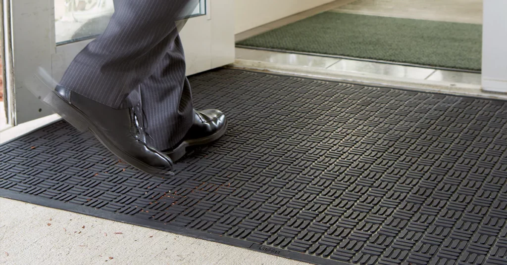 UniScraper rubber scraper mats from UniFirst outside the entrance of a business