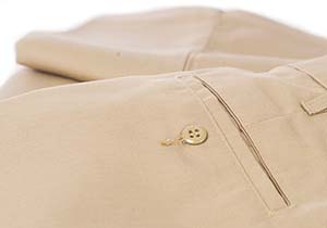 Clean, folded uniform pants showing pocket