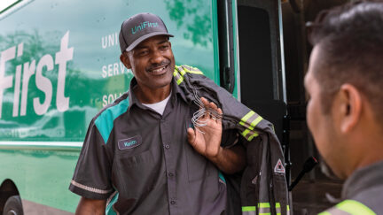 Elevate your uniform rental service with UniFirst. Our UniFirst RSR delivering uniforms to our customers.