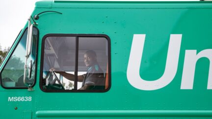 UniFirst service delivery van delivering uniforms and facility service products every week to more than 300,000 customer sites throughout North America.