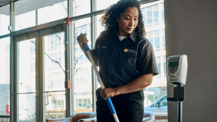employee-using-floor-mop-1200×628
