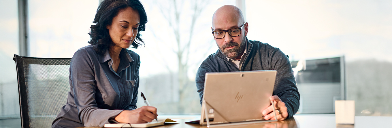 UniFirst representative working with customer on UniFirst Portal